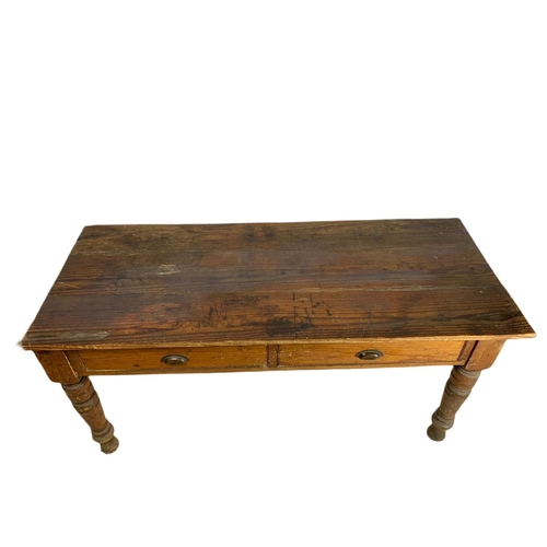 907 - Victorian pitch pine 2 drawer farmhouse table. 163/67/78cm