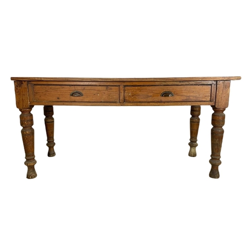 907 - Victorian pitch pine 2 drawer farmhouse table. 163/67/78cm