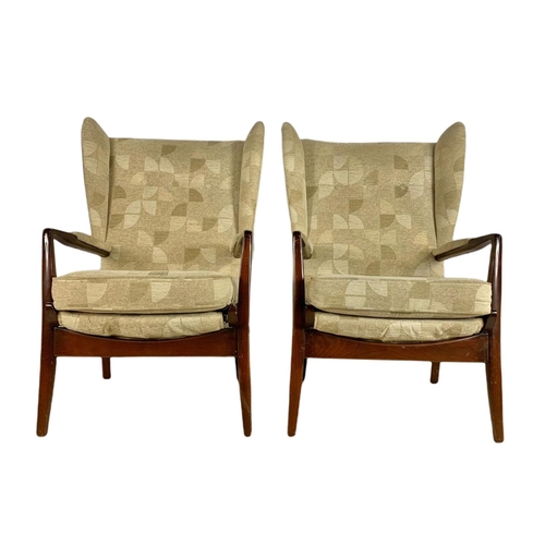 946 - Pair of mid century vintage Cintique wingback armchairs