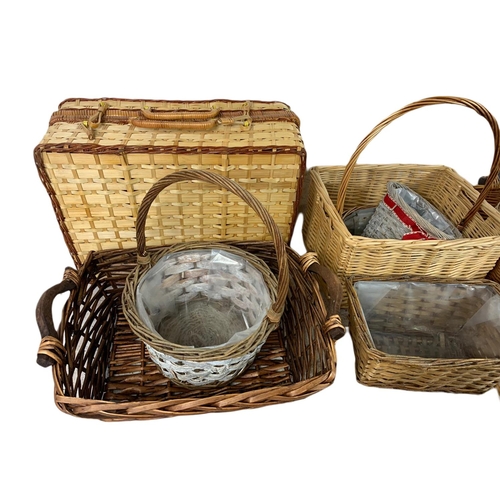 335 - Quantity of wicker baskets. Largest 38cm