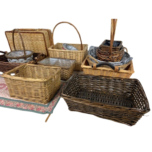 335 - Quantity of wicker baskets. Largest 38cm