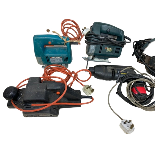 389 - 5 Black & Decker power tools. Including 2 jigsaws, circular saw, sander and a drill