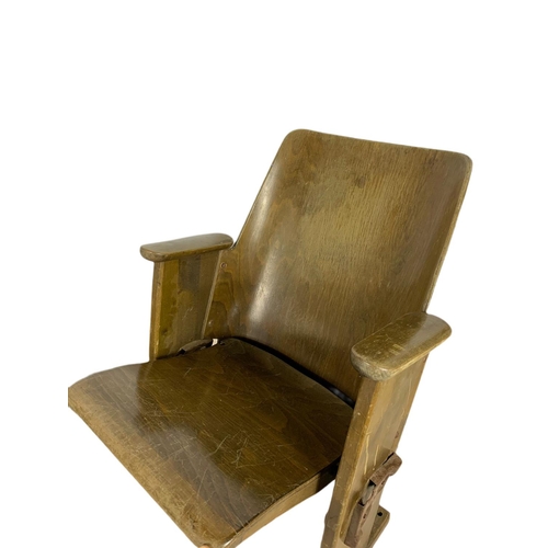 949 - Pair of early 20th century cinema seats. Circa 1920’s. Width 59cm