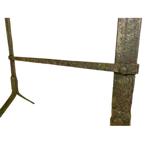 351 - Early 20th century iron trestle stand. 106/89cm