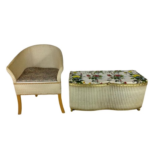 812 - 2 piece of vintage wicker furniture. Including an armchair and an ottoman. 90cm