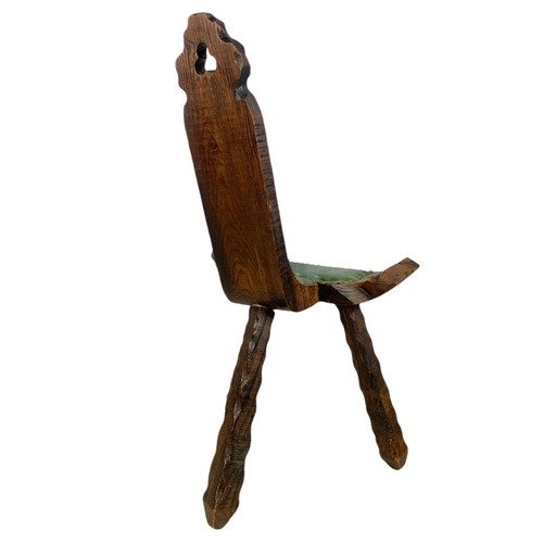 819 - Small carved oak camel chair with leather. 45/42/79cm