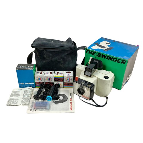 214a - The Swinger Polaroid camera with box, case and accessories.