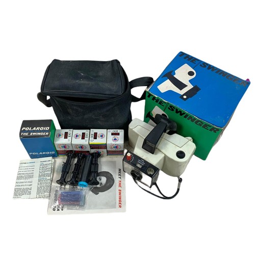 214a - The Swinger Polaroid camera with box, case and accessories.