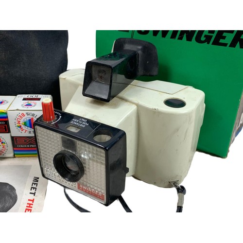 214a - The Swinger Polaroid camera with box, case and accessories.