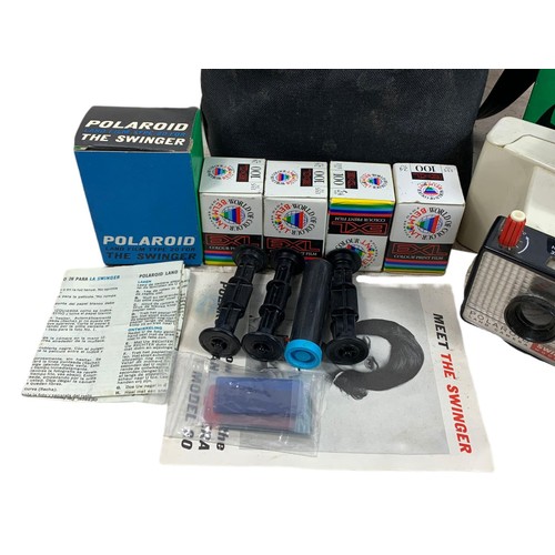 214a - The Swinger Polaroid camera with box, case and accessories.