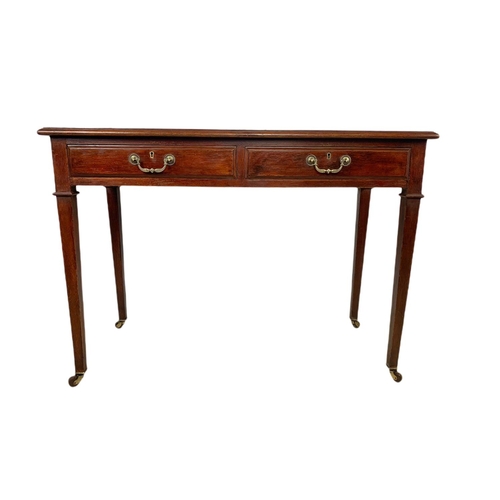 1010 - Edwardian oak leather top 2 drawer writing table. 107/49/76.5c