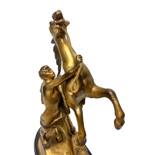 202a - Pair of early 20th century spelter Marley horse figures, largest is 32cm