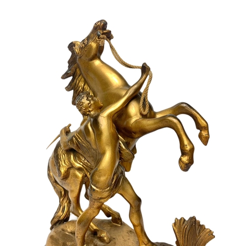 202a - Pair of early 20th century spelter Marley horse figures, largest is 32cm