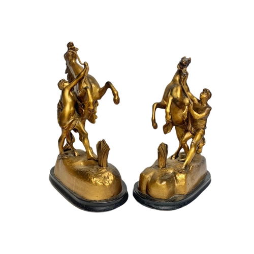 202a - Pair of early 20th century spelter Marley horse figures, largest is 32cm