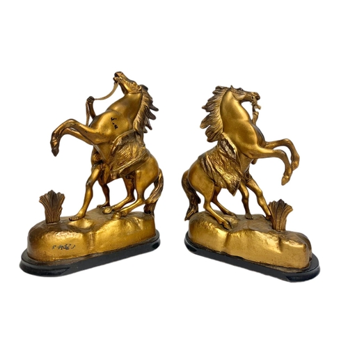 202a - Pair of early 20th century spelter Marley horse figures, largest is 32cm