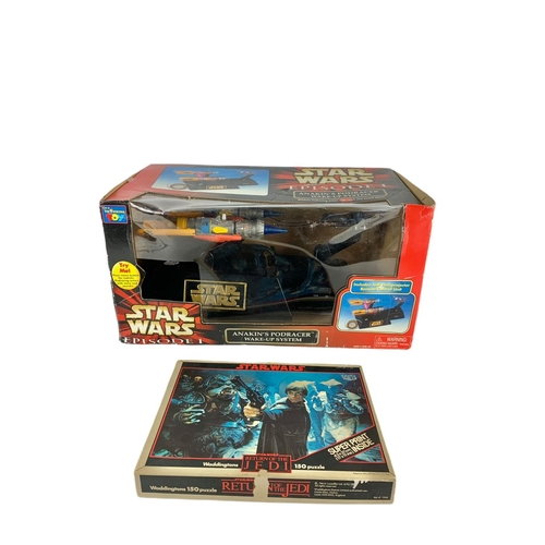 165a - Star Wars toy and puzzle in box. Anakin’s Podracer Wake-UP System. 44.5/24.5cm