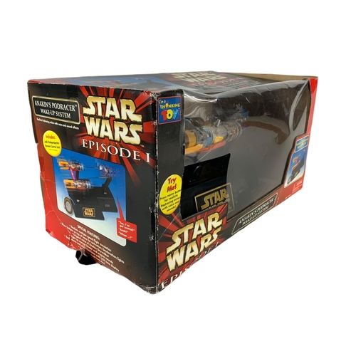 165a - Star Wars toy and puzzle in box. Anakin’s Podracer Wake-UP System. 44.5/24.5cm