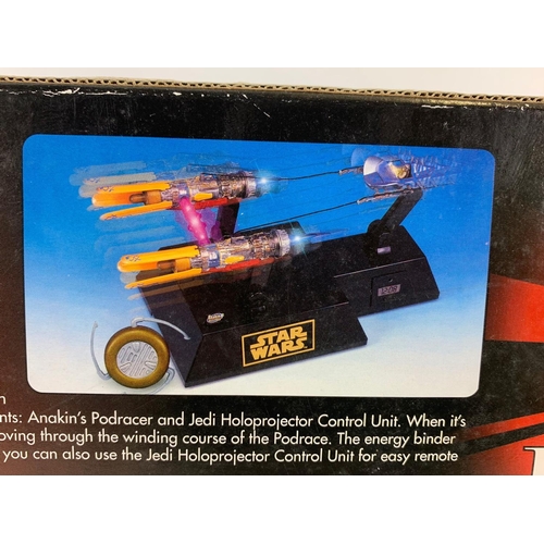 165a - Star Wars toy and puzzle in box. Anakin’s Podracer Wake-UP System. 44.5/24.5cm