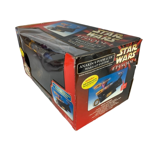 165a - Star Wars toy and puzzle in box. Anakin’s Podracer Wake-UP System. 44.5/24.5cm