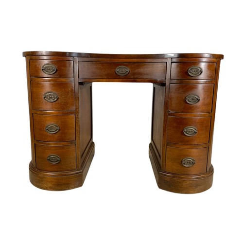 990 - 1950s Georgian style mahogany kidney shaped desk, made in Jamestown NY. 113/60/77cm.