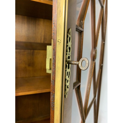 992 - Large Regency style inlaid mahogany bookcase. 110/44/195cm