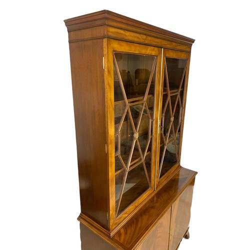 992 - Large Regency style inlaid mahogany bookcase. 110/44/195cm