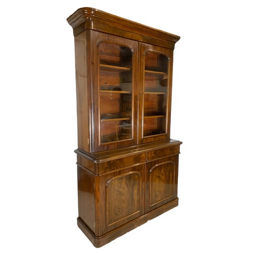 1001 - Large Victorian mahogany bookcase with 2 drawers. 141/50/234cm