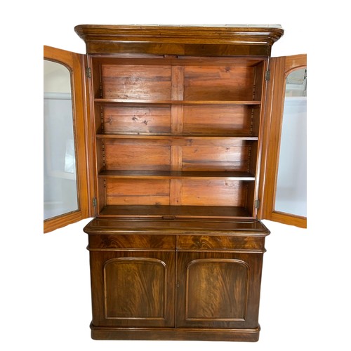 1001 - Large Victorian mahogany bookcase with 2 drawers. 141/50/234cm