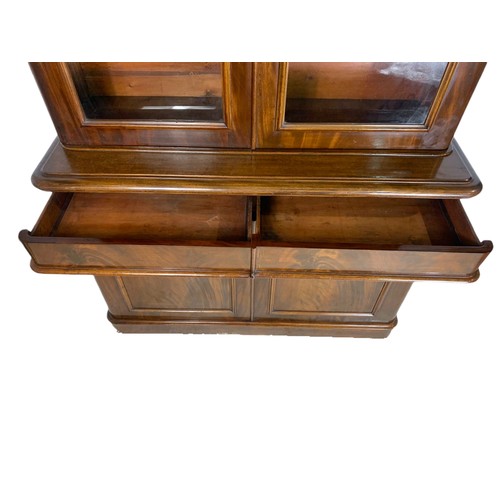 1001 - Large Victorian mahogany bookcase with 2 drawers. 141/50/234cm