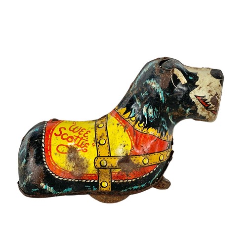 120a - 1920’s Marx tinplate “Wee Scottie” wind up toy. 13cm