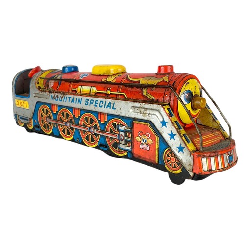 120b - Vintage Mountain Special tin plate toy train. 40cm