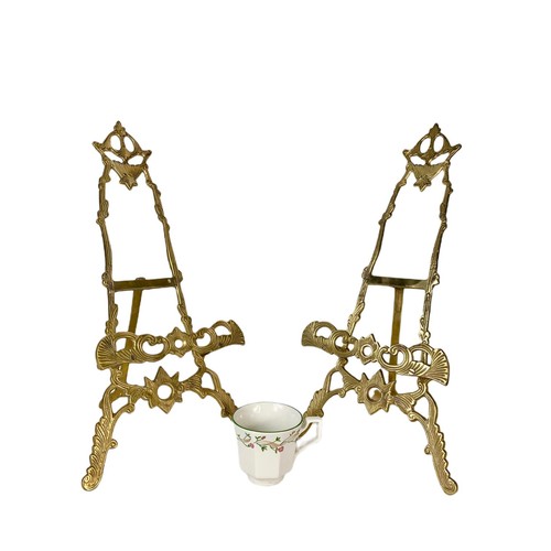 624 - Pair of ornate brass easels. 52cm