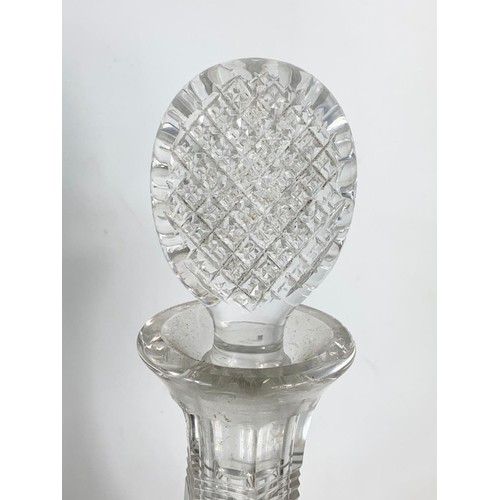 629 - Victorian cut glass etched decanter and an Edwardian decanter. 31cm