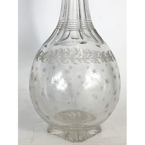 629 - Victorian cut glass etched decanter and an Edwardian decanter. 31cm