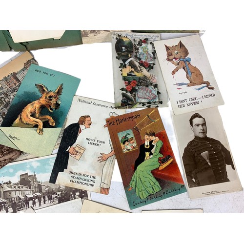 689 - Quantity of early 20th century and Victorian postcards and photographs, including novelty postcards,... 