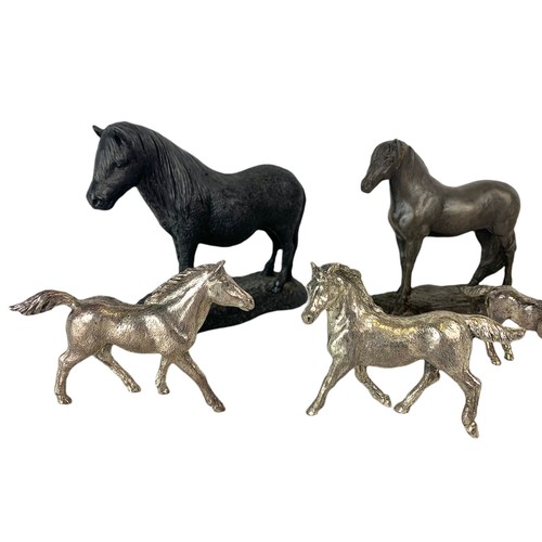 622 - Pair of vintage brass candlesticks and an iron, including miniature horse figures and a model Airfix