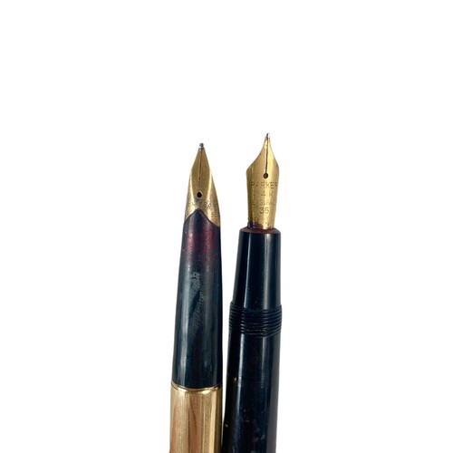 697 - 2 14k gold nib Parker Pens.