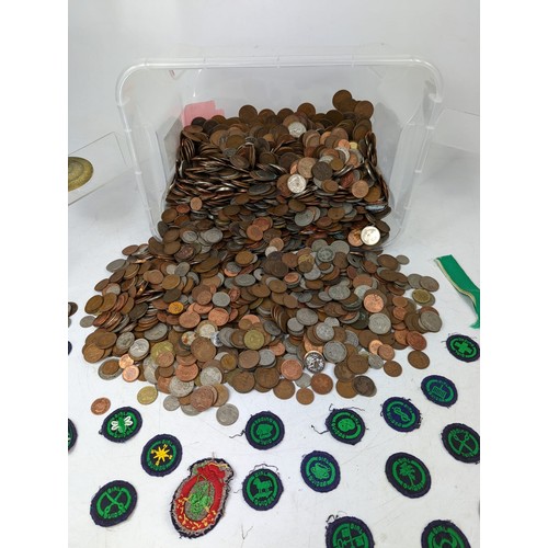 700 - Large quantity of British and foreign coins, with badges, etc.