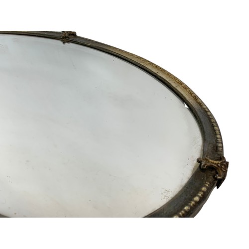 509 - Early 20th century brass framed mirror. 66/45cm