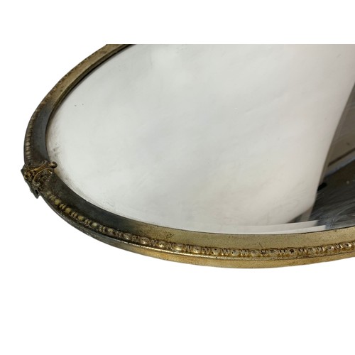 509 - Early 20th century brass framed mirror. 66/45cm