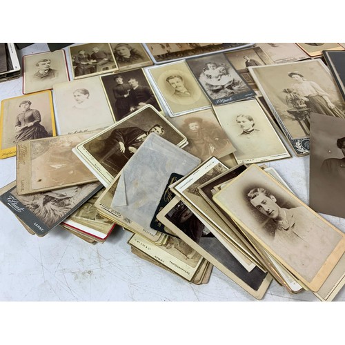 703 - Large quantity of Victorian photographs.