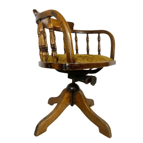 927 - Edwardian oak swivel desk chair.