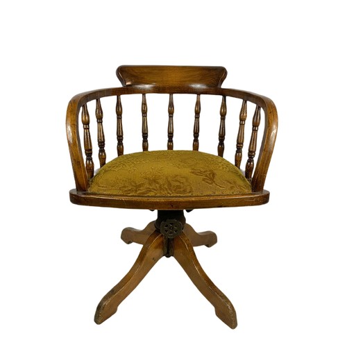 927 - Edwardian oak swivel desk chair.