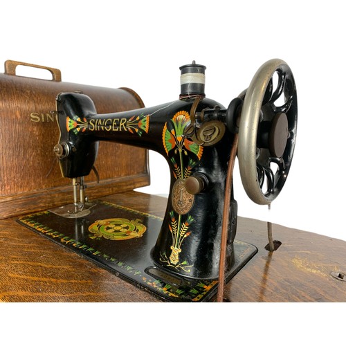 1002 - Early 20th century singer sewing machine table, 90/41/103cm