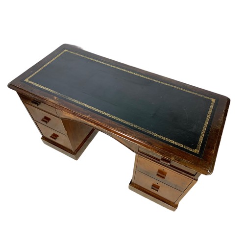 1020 - Early 20th century leather top writing desk. Circa 1930’s. 131/59/73cm