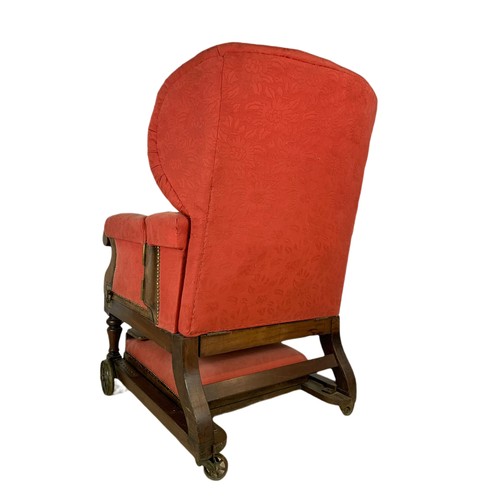 935 - A Victorian mahogany convalescence armchair by John Ward, London, 1880/1900. 76/79/107cm.