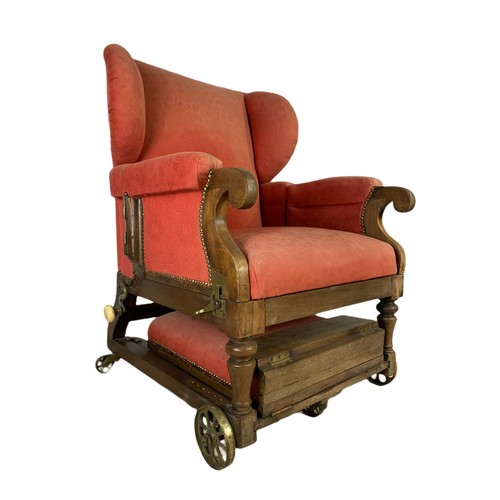 935 - A Victorian mahogany convalescence armchair by John Ward, London, 1880/1900. 76/79/107cm.