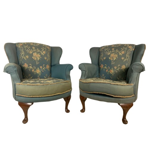 1063 - Pair of small 1950’s wingback armchairs. 64/70/88cm