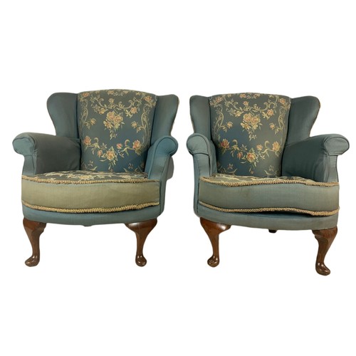 1063 - Pair of small 1950’s wingback armchairs. 64/70/88cm