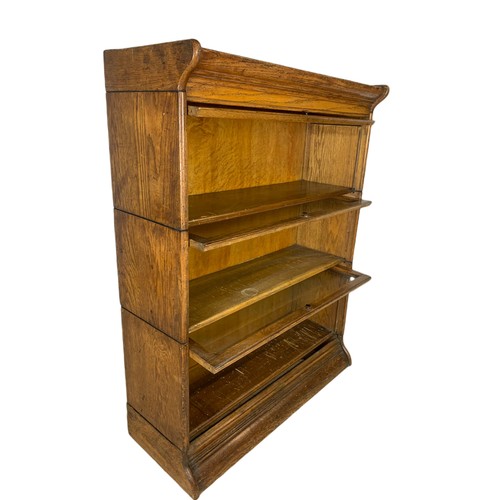 1007 - Edwardian oak stacking bookcase. 87/34/118cm